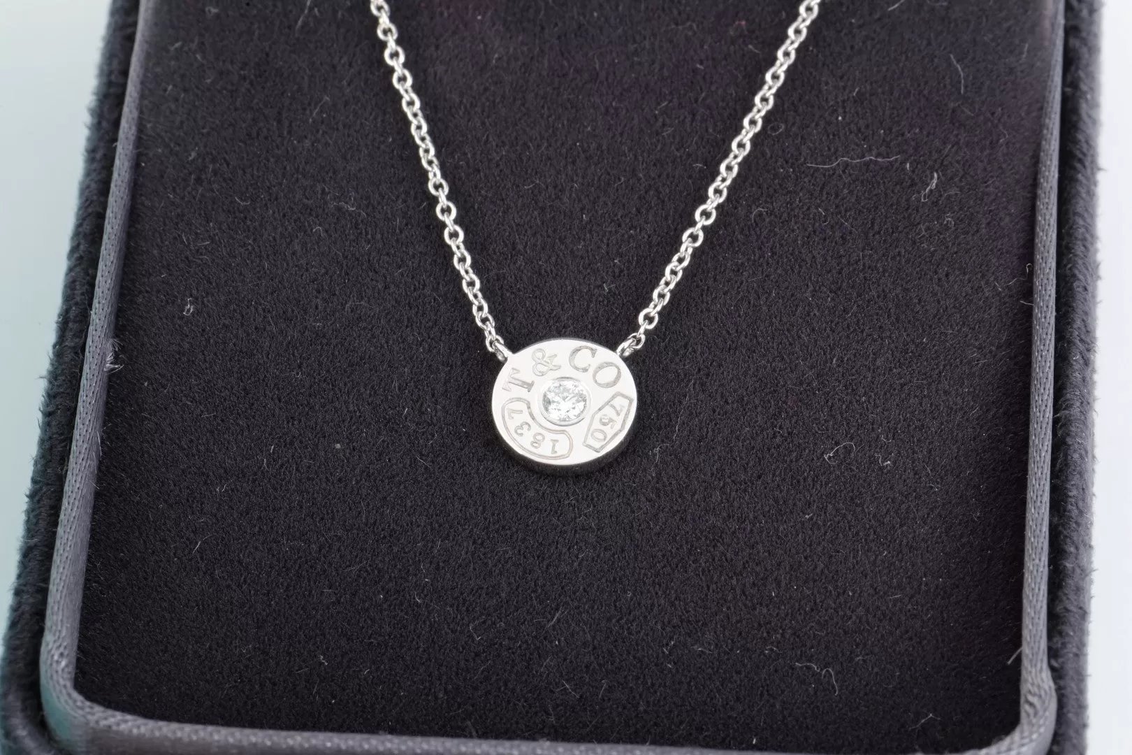 16" Tiffany & Co. 18k White Gold Diamond 1837 Circle Pendant Necklace (2.70g.)