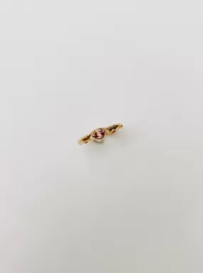 18k gold ring with pink/orange sapphire