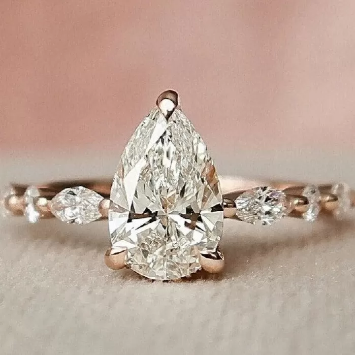 Solitaire Pear Cut with Marquise Cut Stone Engagement Ring in Sterling Silver